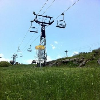 Disc golf tee located below the chair lift at Beech Mountain Resort.