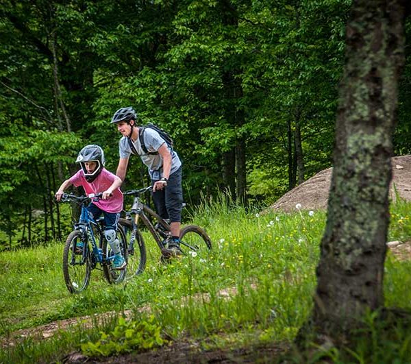 mountain biking down ski slopes