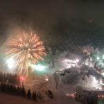 Fireworks display over a snow covered Beech Mountain Ski Resort